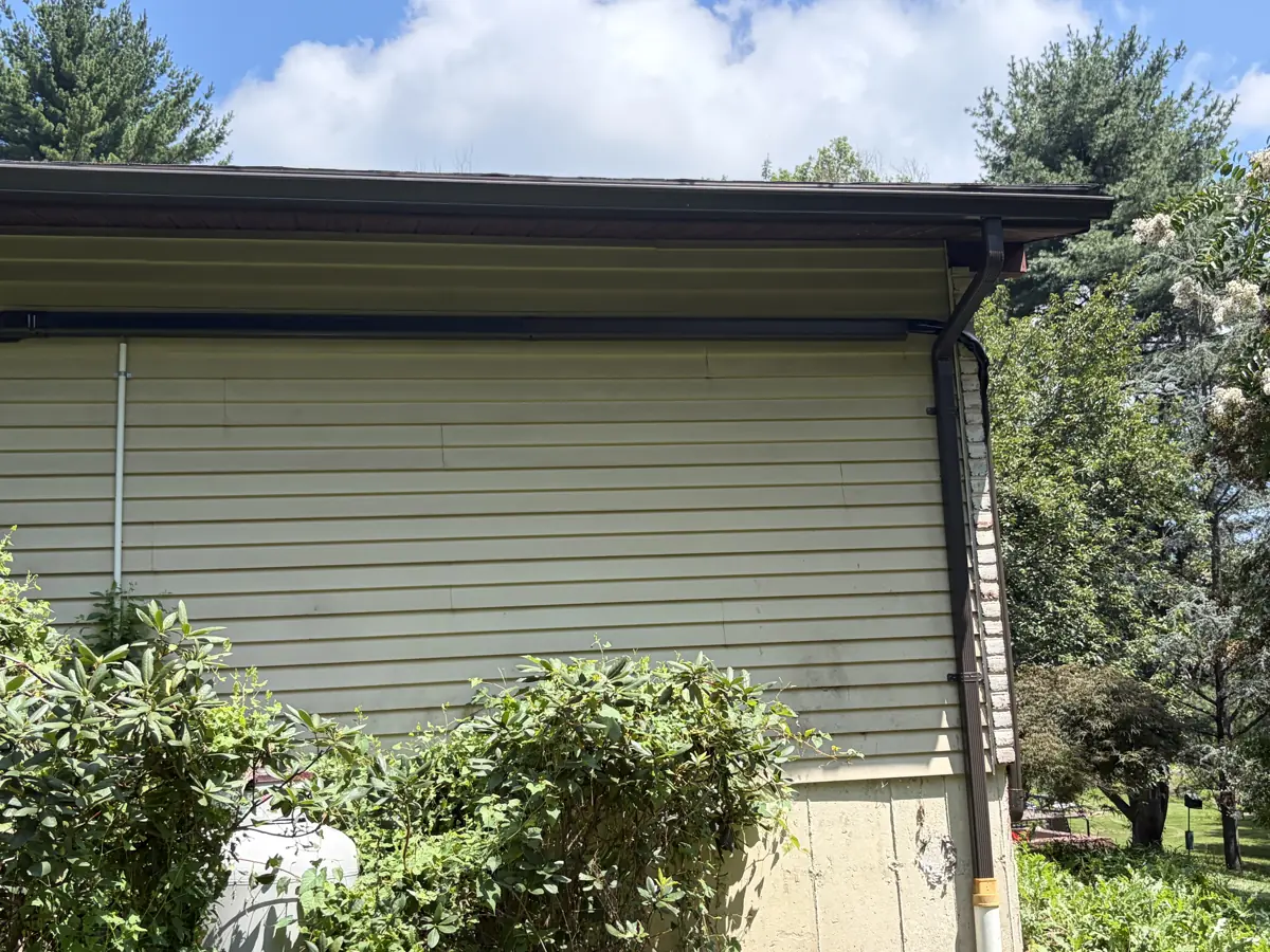 Vinyl siding and gutter work on a home in the Lehigh Valley by LV Roofing & Siding